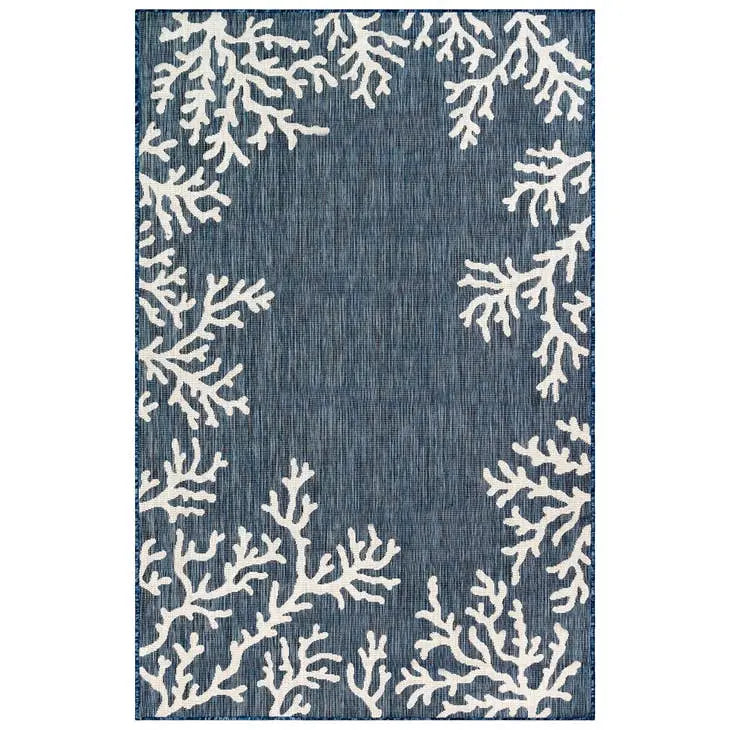 Blue rug with white coral pattern