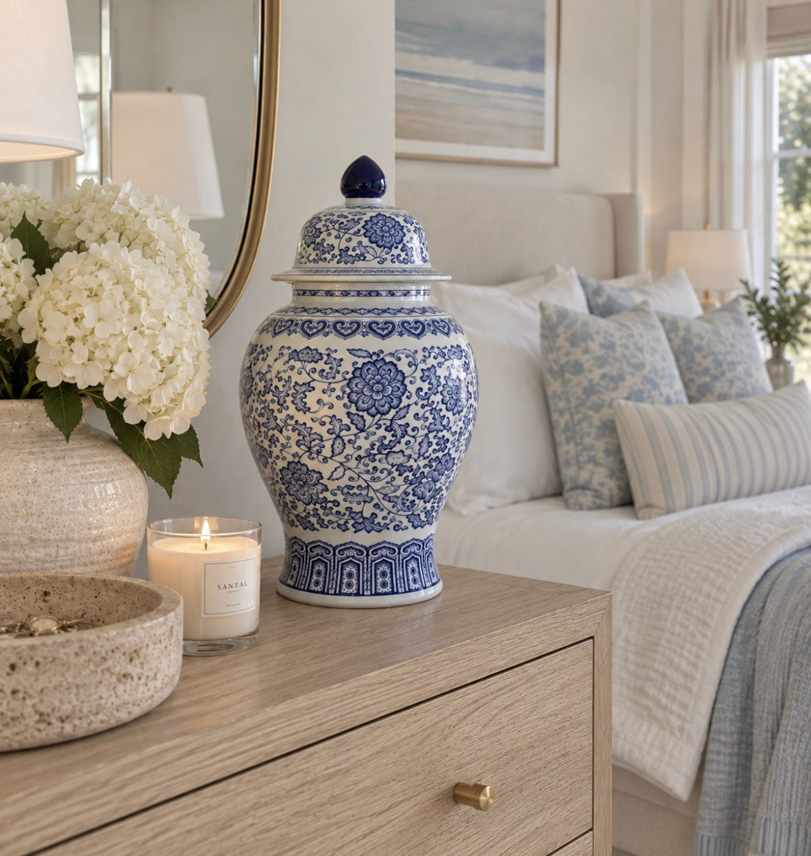 Chinese-inspired blue and white ginger jar with a traditional floral scroll design