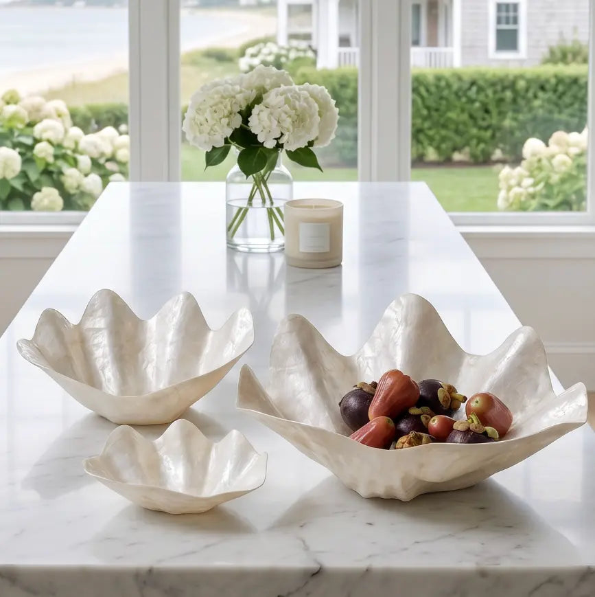 Shell bowl centerpiece crafted from genuine mother of pearl for elegant decor.