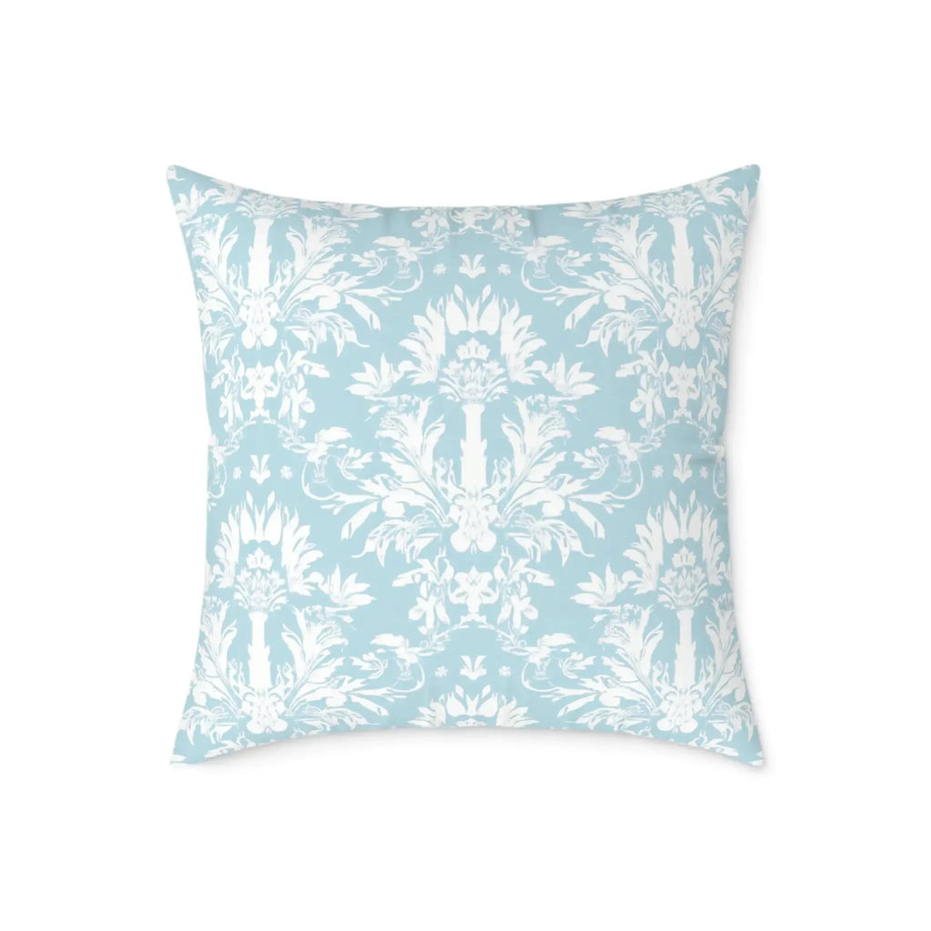 coastal-inspired blue pillow layered for a designer look