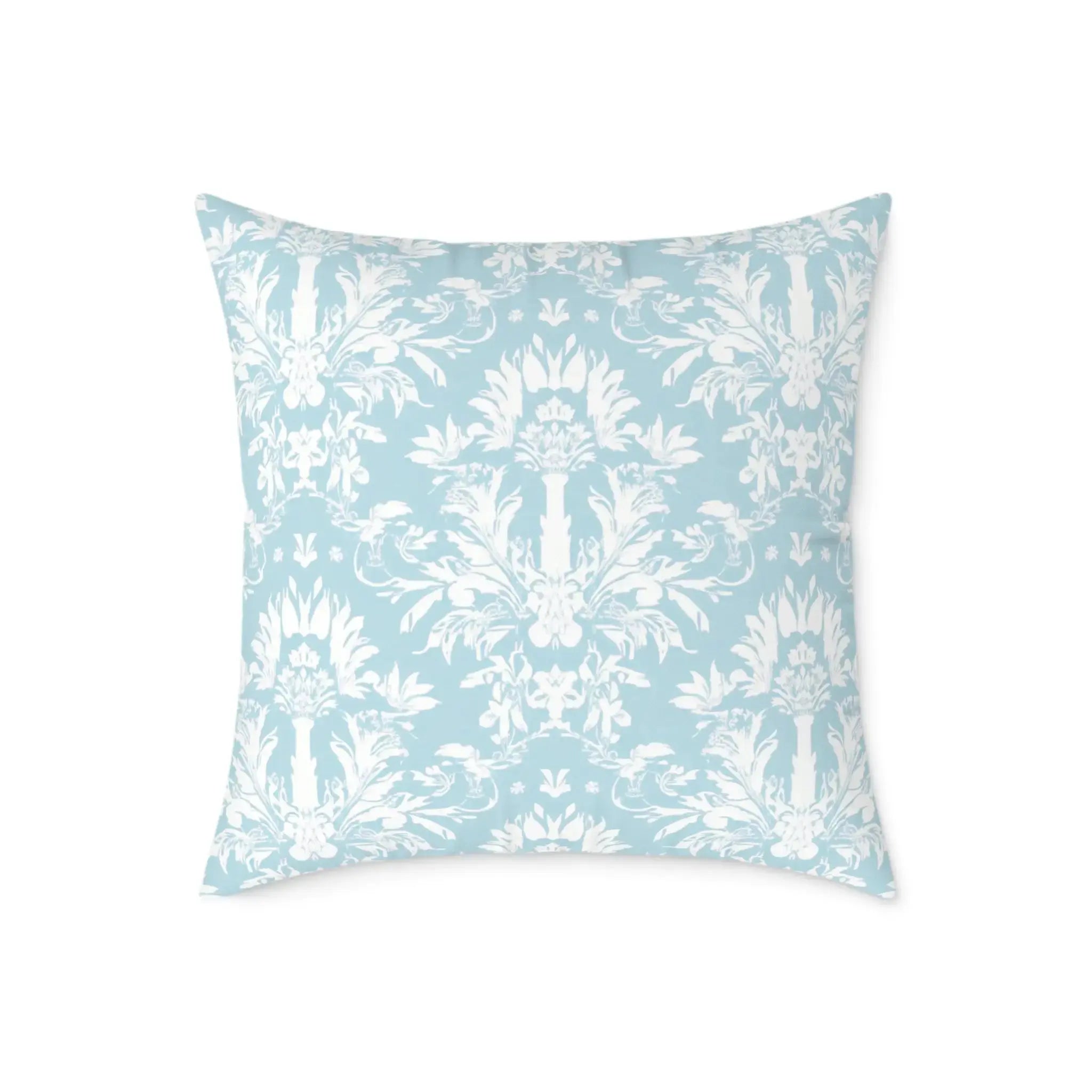 coastal-inspired blue pillow layered for a designer look