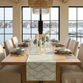 Coastal aqua wave table runner on an ocean-inspired dining table