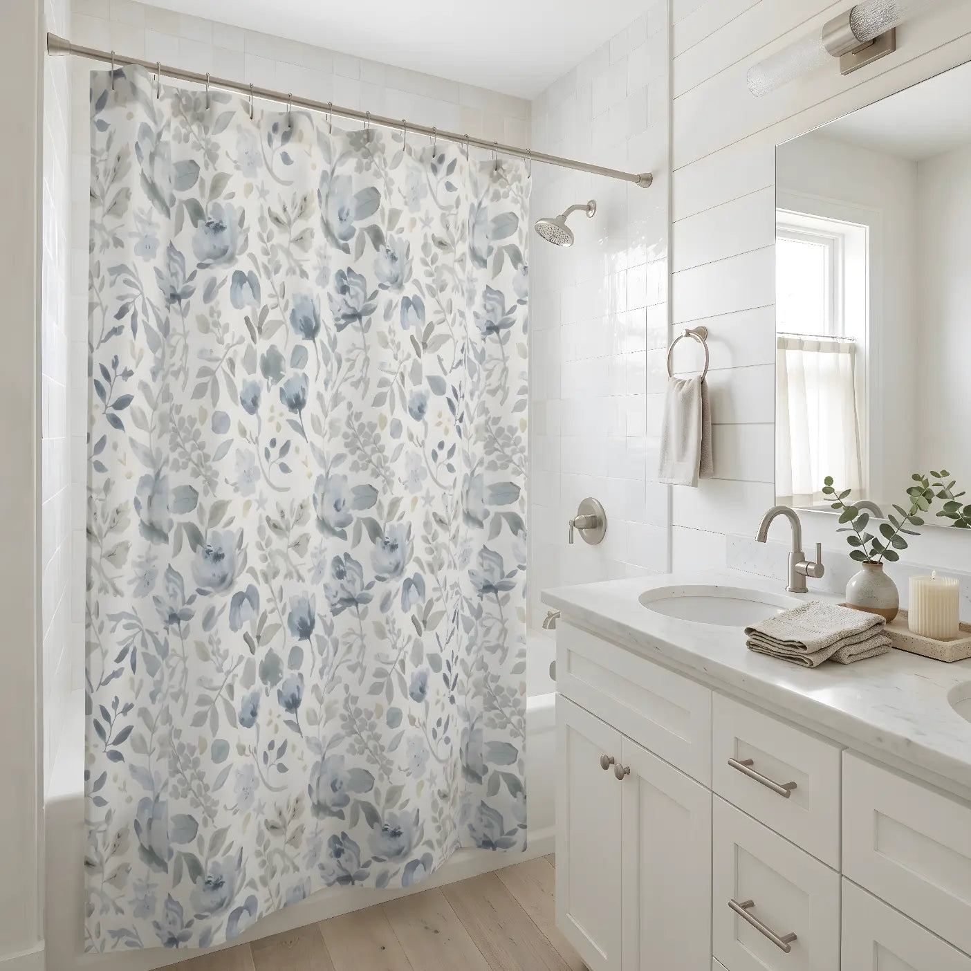 Sophisticated coastal bathroom featuring a blue botanical shower curtain