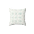 Capri Polka Dot Throw Pillow with turquoise dots on a cream background.