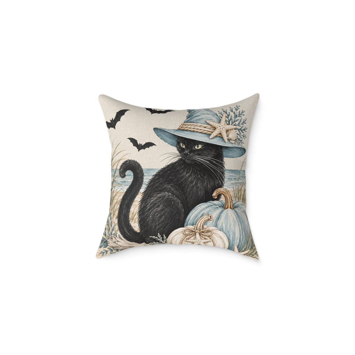 Coastal black cat and pumpkin throw cushion with a seaside background and muted blue accents