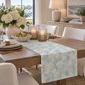 Coastal blue botanical dining runner with soft ivory flowers for a beach house tablescape