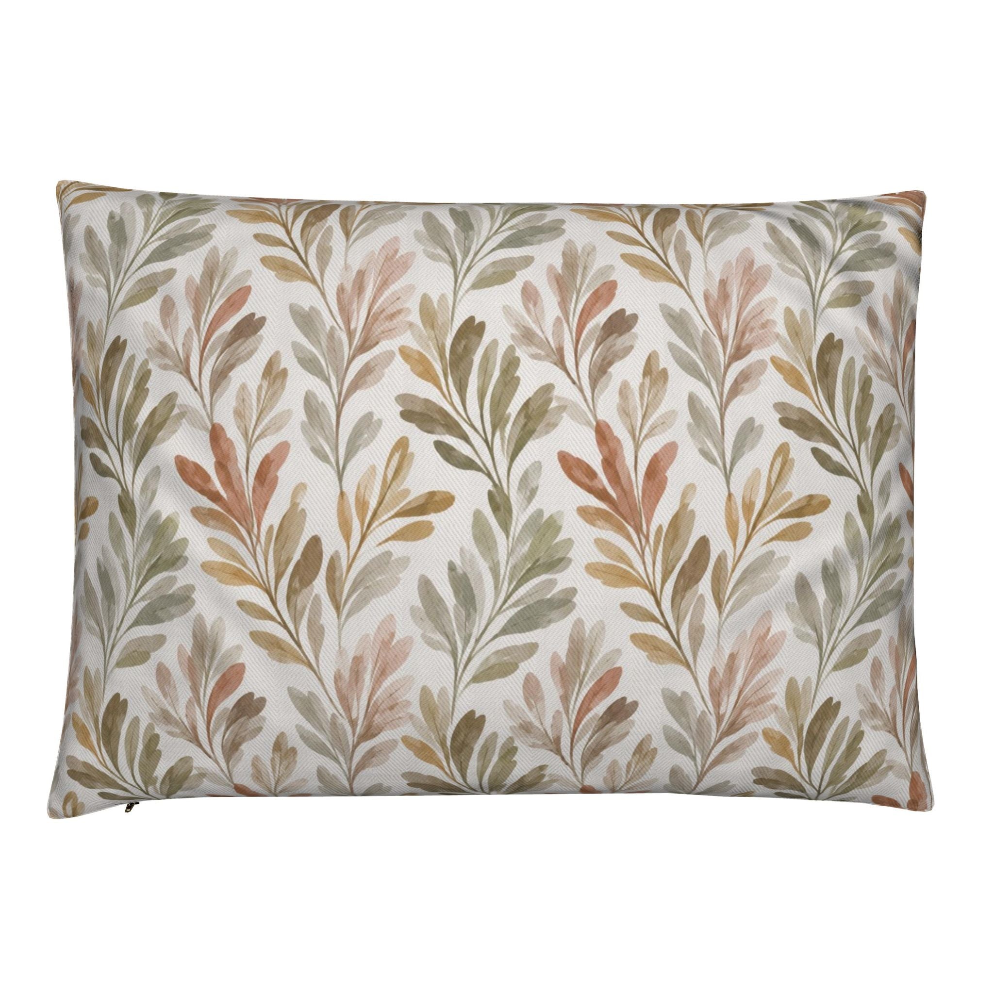 Botanical coastal pillow with painterly olive branches, styled for layered fall living room décor.