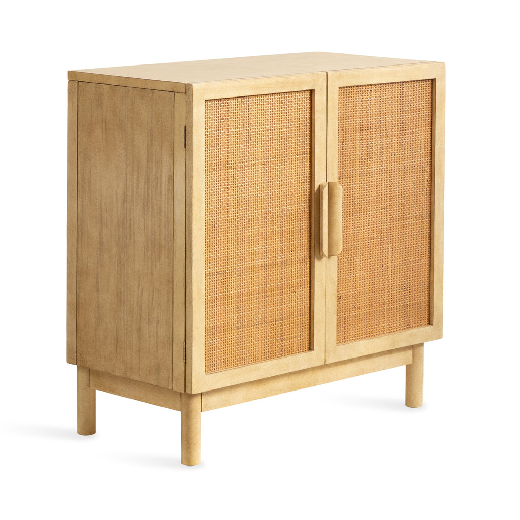 Coastal cane door accent cabinet with woven natural panels and a light wood frame