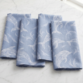 Coastal dolphin linen napkins set of 4 styled on a beach house dining table