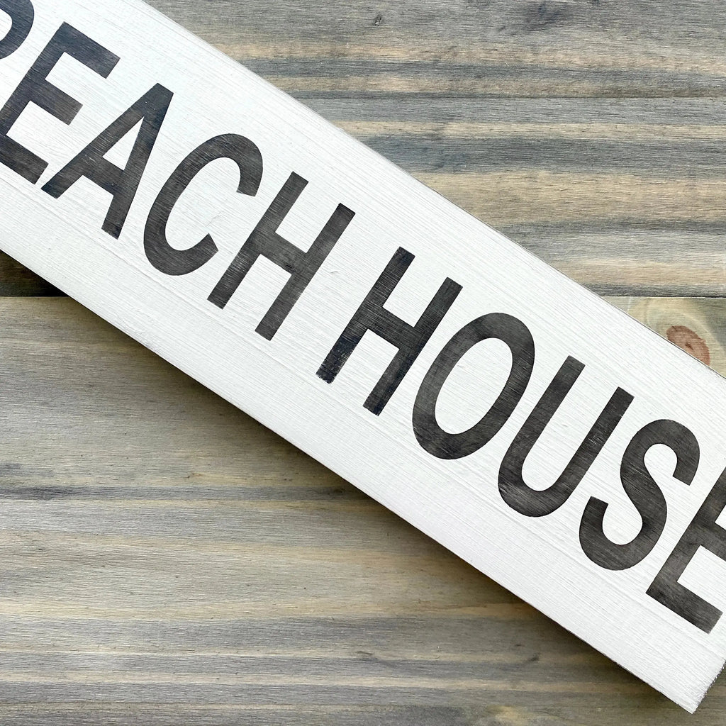 coastal wall sign with white background and custom lettering