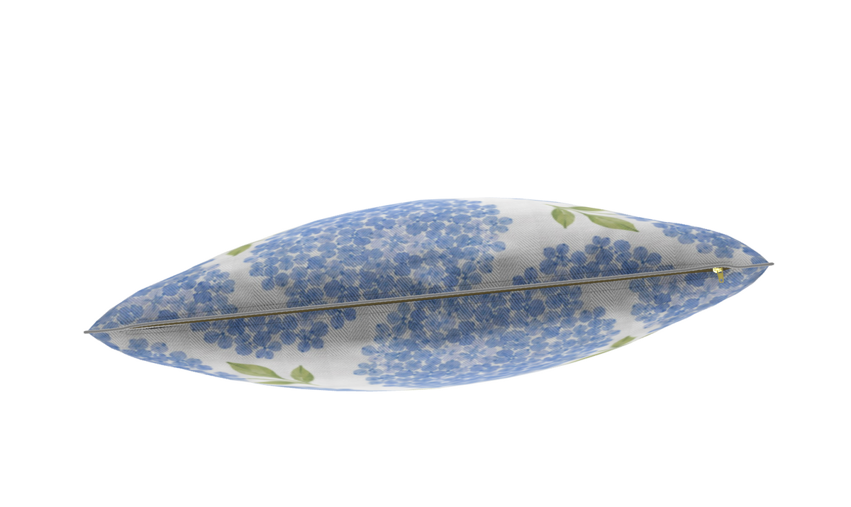 Coastal garden hydrangea decorative pillow with blue floral clusters and leafy branches
