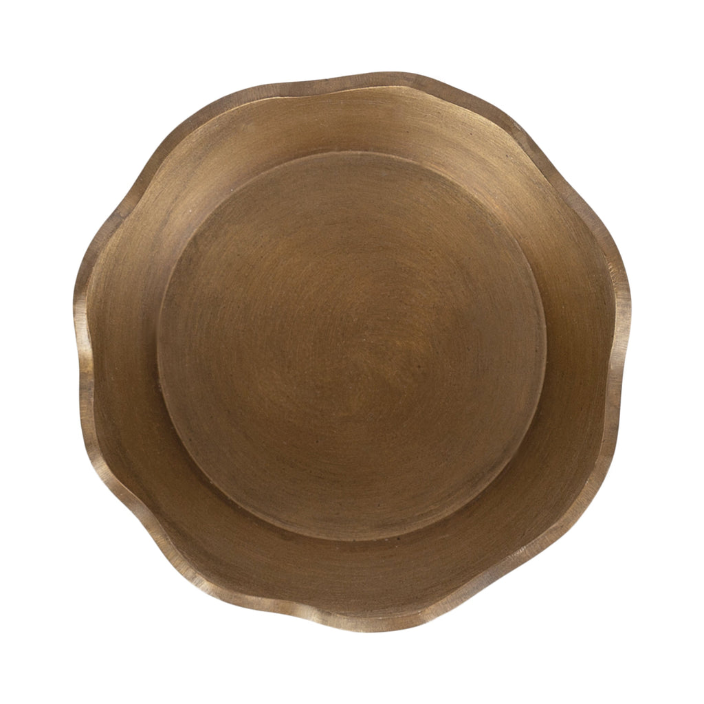 Coastal gold candle holders with an organic sculptural silhouette.