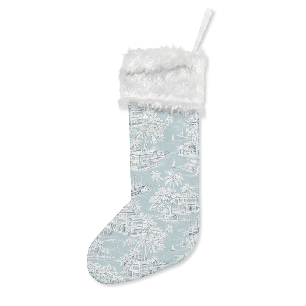 Traditional blue and white toile Christmas stocking complementing classic coastal and grandmillennial home décor.