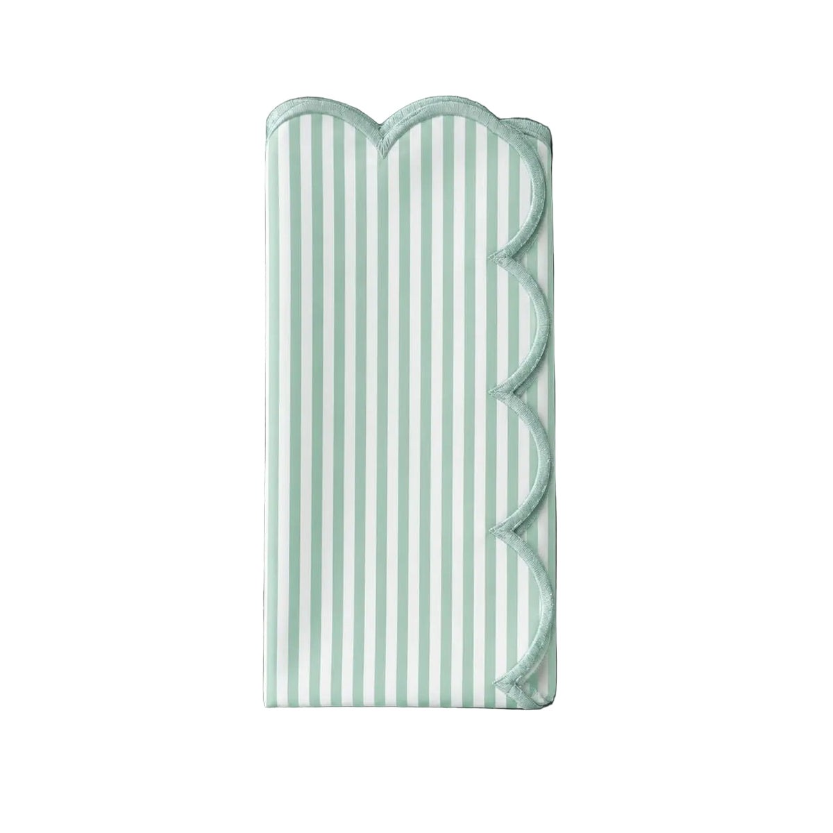 Coastal striped napkins with scalloped edges for an elegant seaside-inspired tablescape.