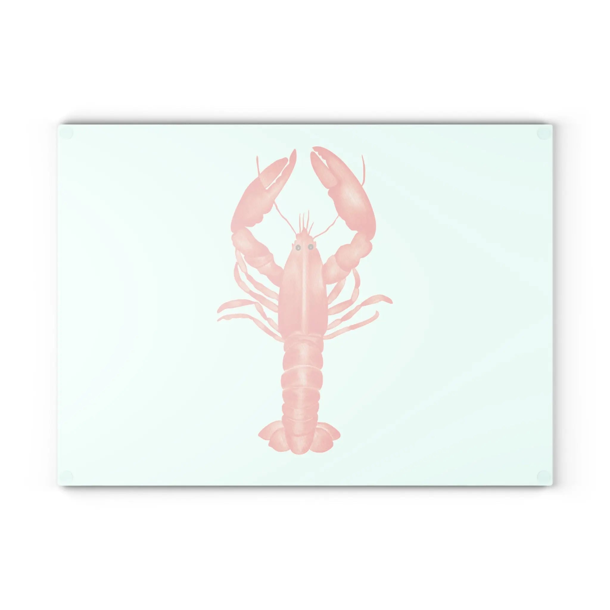 Harbor Lobster Glass Cutting Board with a pink lobster graphic on a pale aqua background.