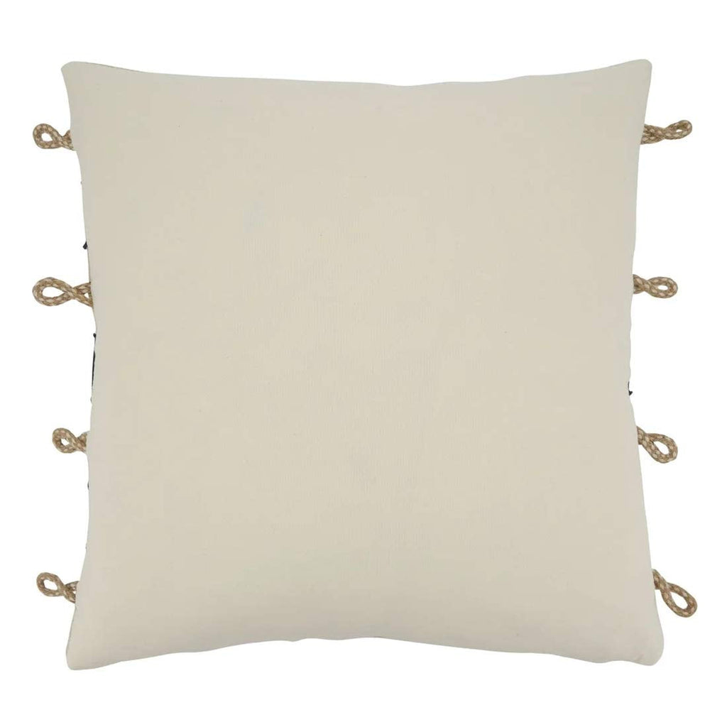 Navy decorative throw pillow with rope knot appliqué adding coastal character to the sofa.