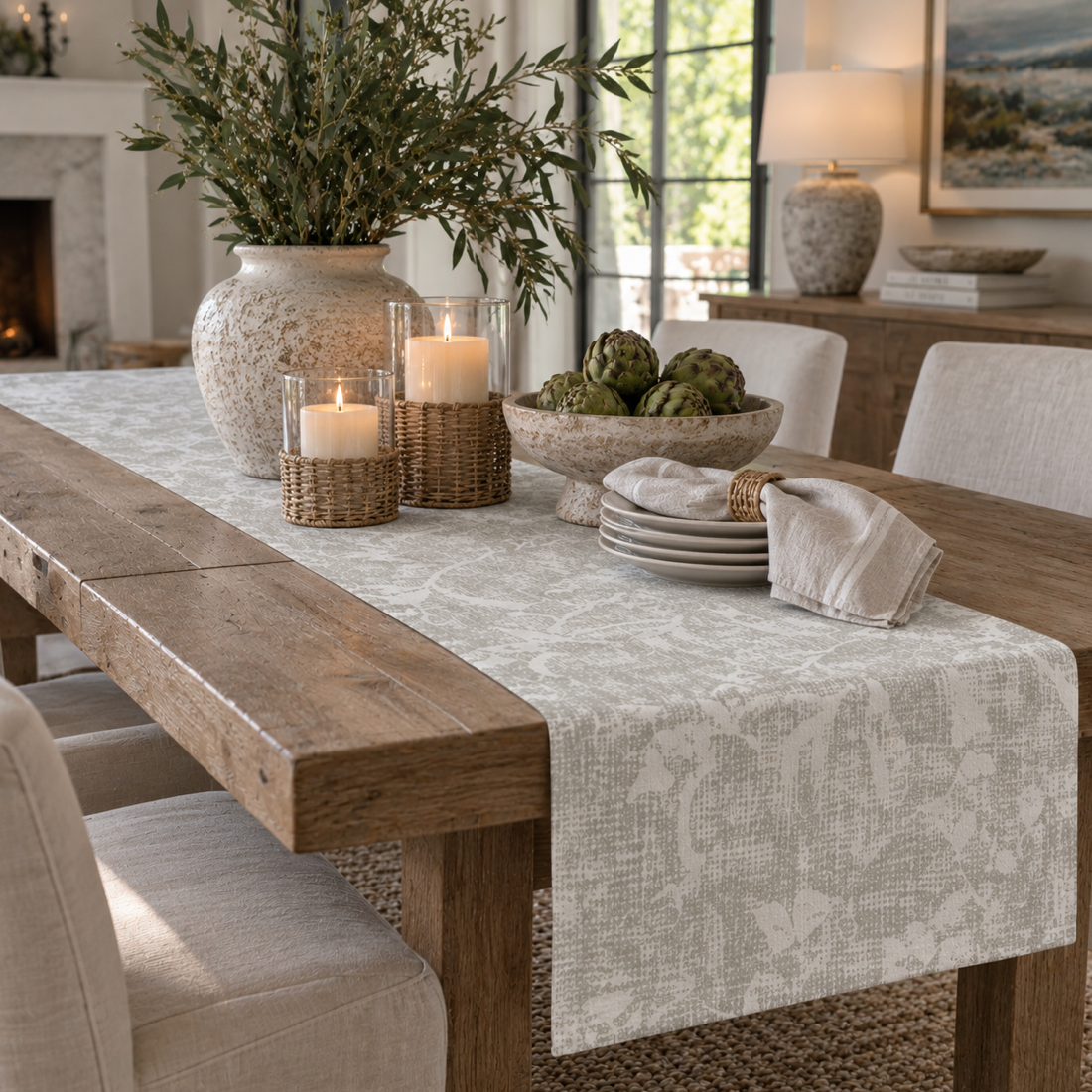Coastal neutral floral table runner with muted taupe botanical artwork on an ivory background