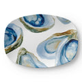 Coastal serving tray with a durable satin finish and oval shape.