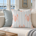 Coastal decorative pillow featuring a red lobster design for seaside home décor.