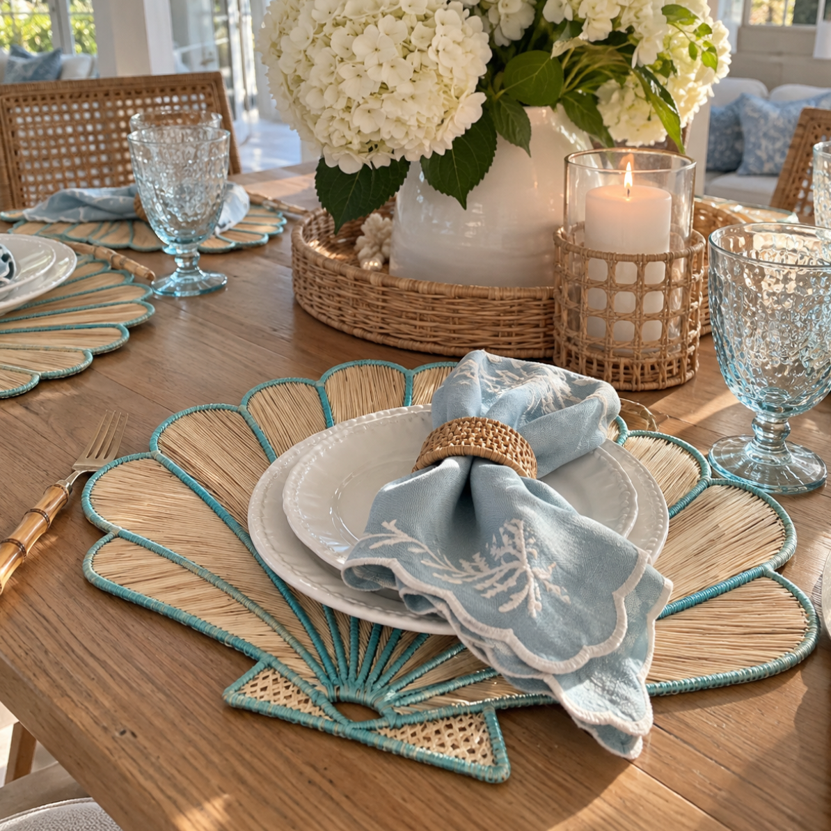 Coastal shell dining placemat with a handwoven natural texture.