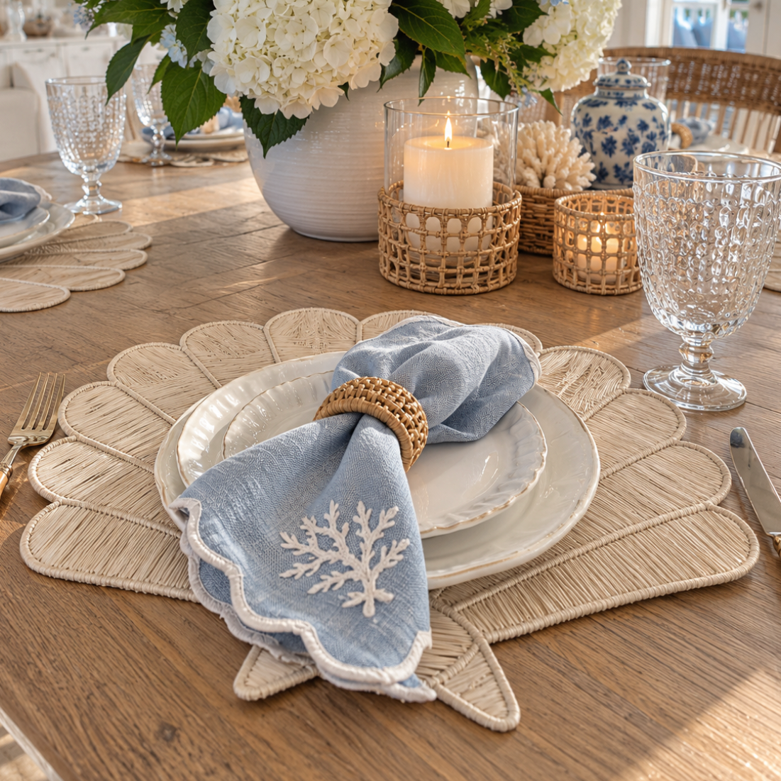Coastal Iraca placemat with a decorative shell design.