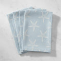 Nantucket Starfish Napkins in seafoam blue, set of 4 with delicate white starfish silhouettes.