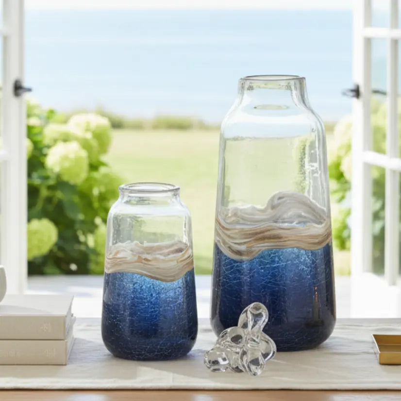 Pair of dark blue swirl vases as modern coastal shelf decor