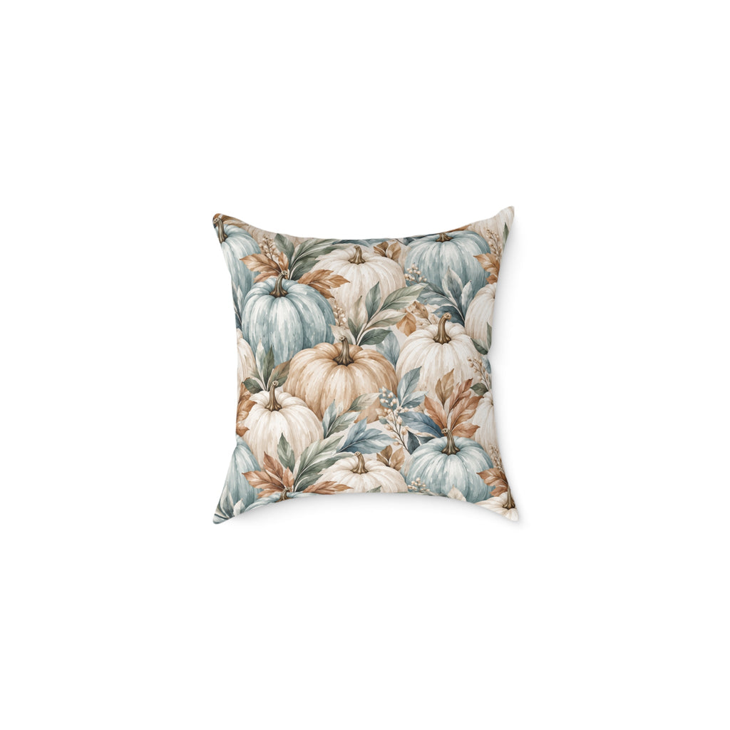 Coastal Thanksgiving pumpkin pillow with layered blue, cream, and ivory gourds and botanical foliage