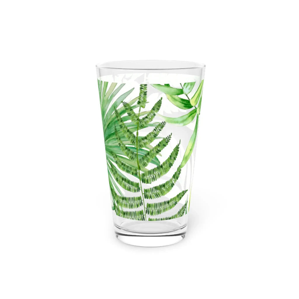 Closeup of etched palm tree design on tropical drinking glass.