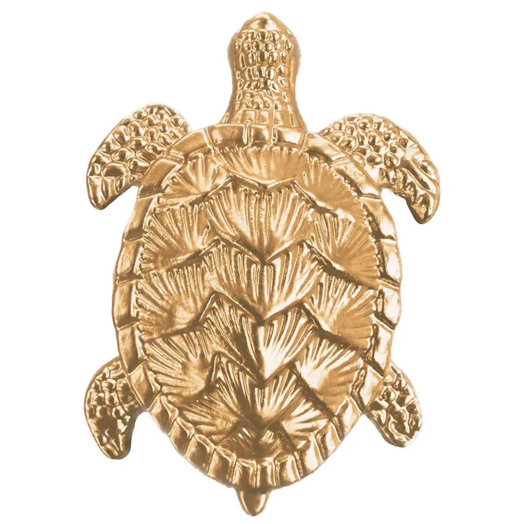 Closeup of gold turtle napkin ring detailing and rust-resistant finish