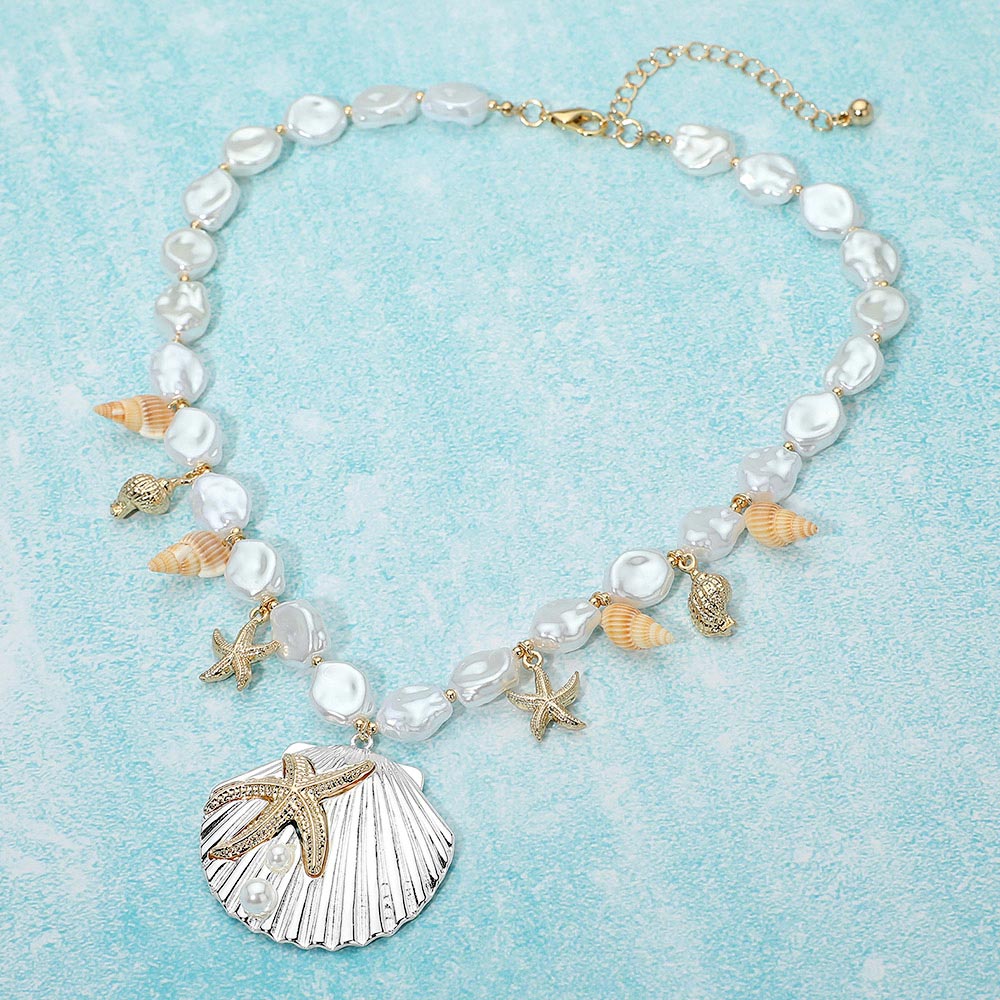 Two-tone starfish embossed seashell pendant charm necklace with pearl beaded strand in coastal beach style.