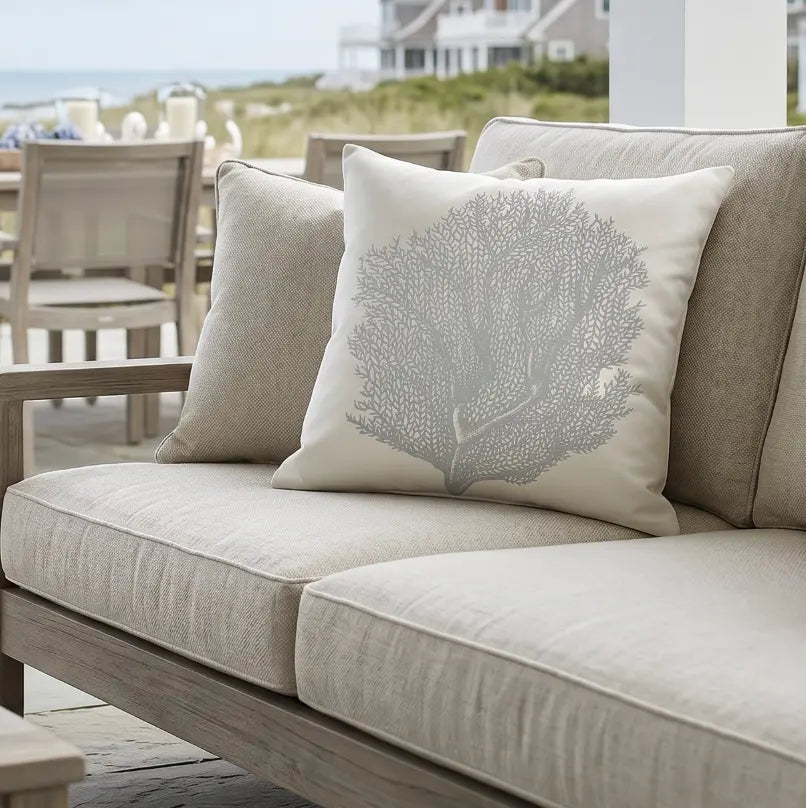 Square coastal coral indoor outdoor pillow, durable accent cushion for patio or sofa.