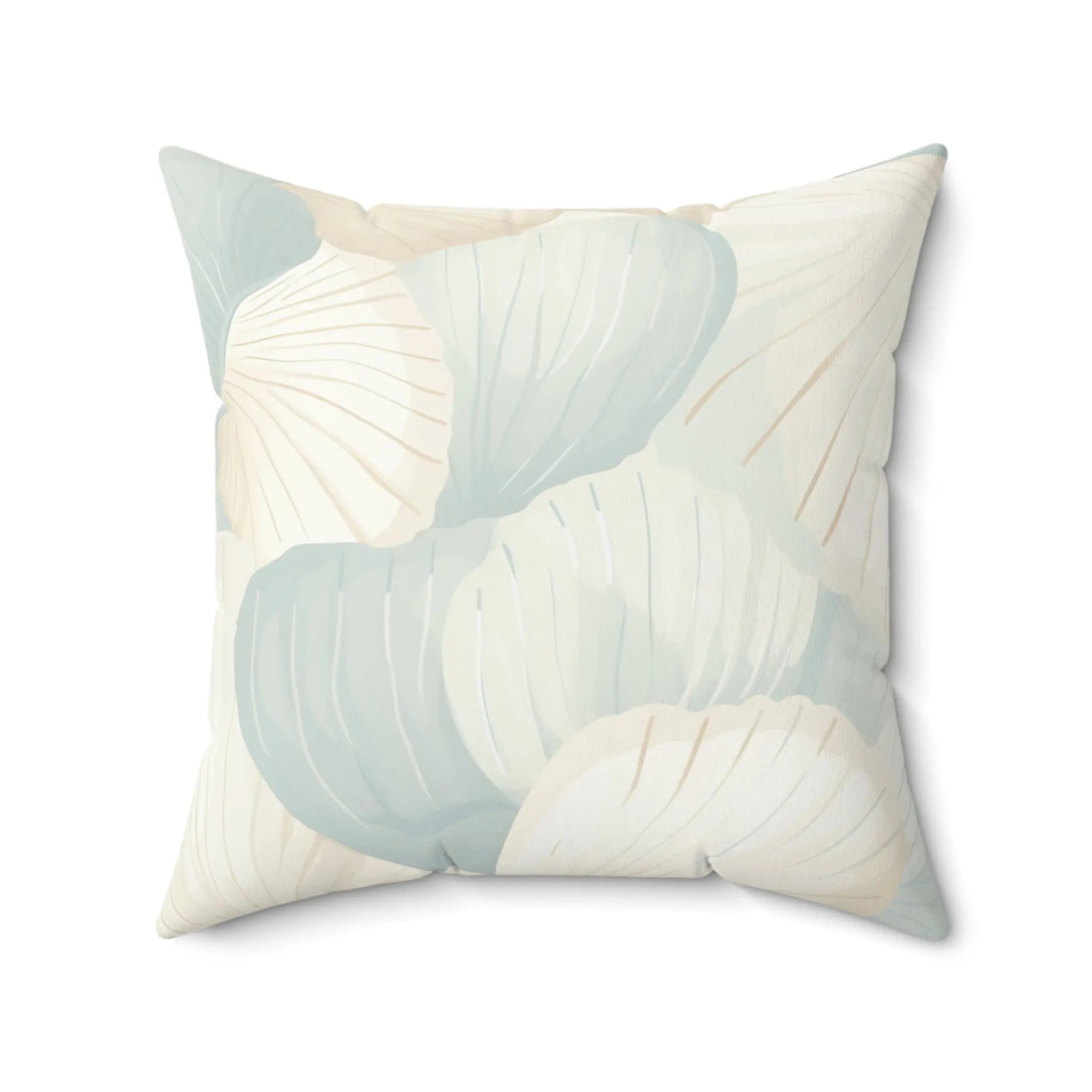 Cream and seafoam shell pattern throw pillow for a coastal sofa