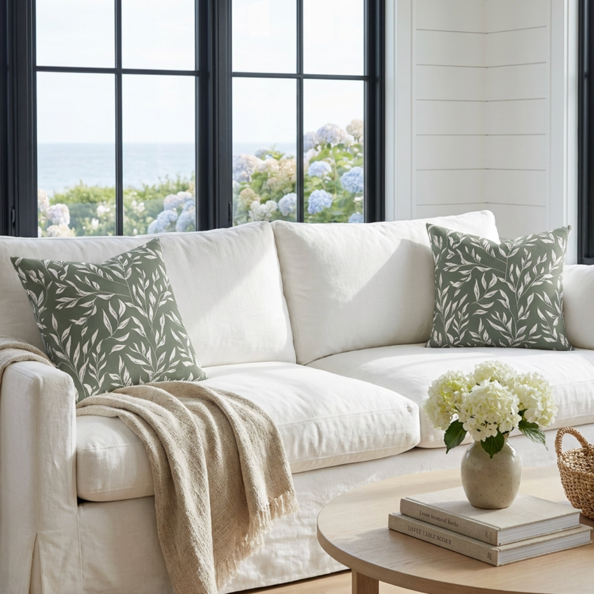 Dark green and white floral throw pillow for coastal, cottage, or farmhouse living room decor.