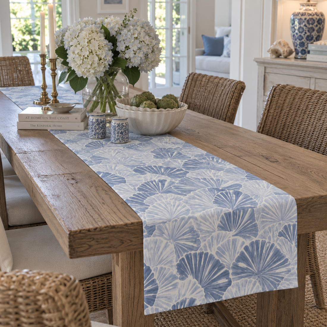 Elegant blue shell coastal table runner with large scallop patterns in soft neutral tones