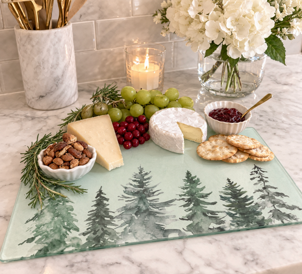 Elegant Christmas glass serving platter featuring watercolor evergreen tree artwork.