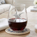 Etched starfish stemless wine glass, coastal barware for beach house entertaining.