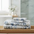 Lightweight blue and white floral towel designed for everyday bath and shower use.