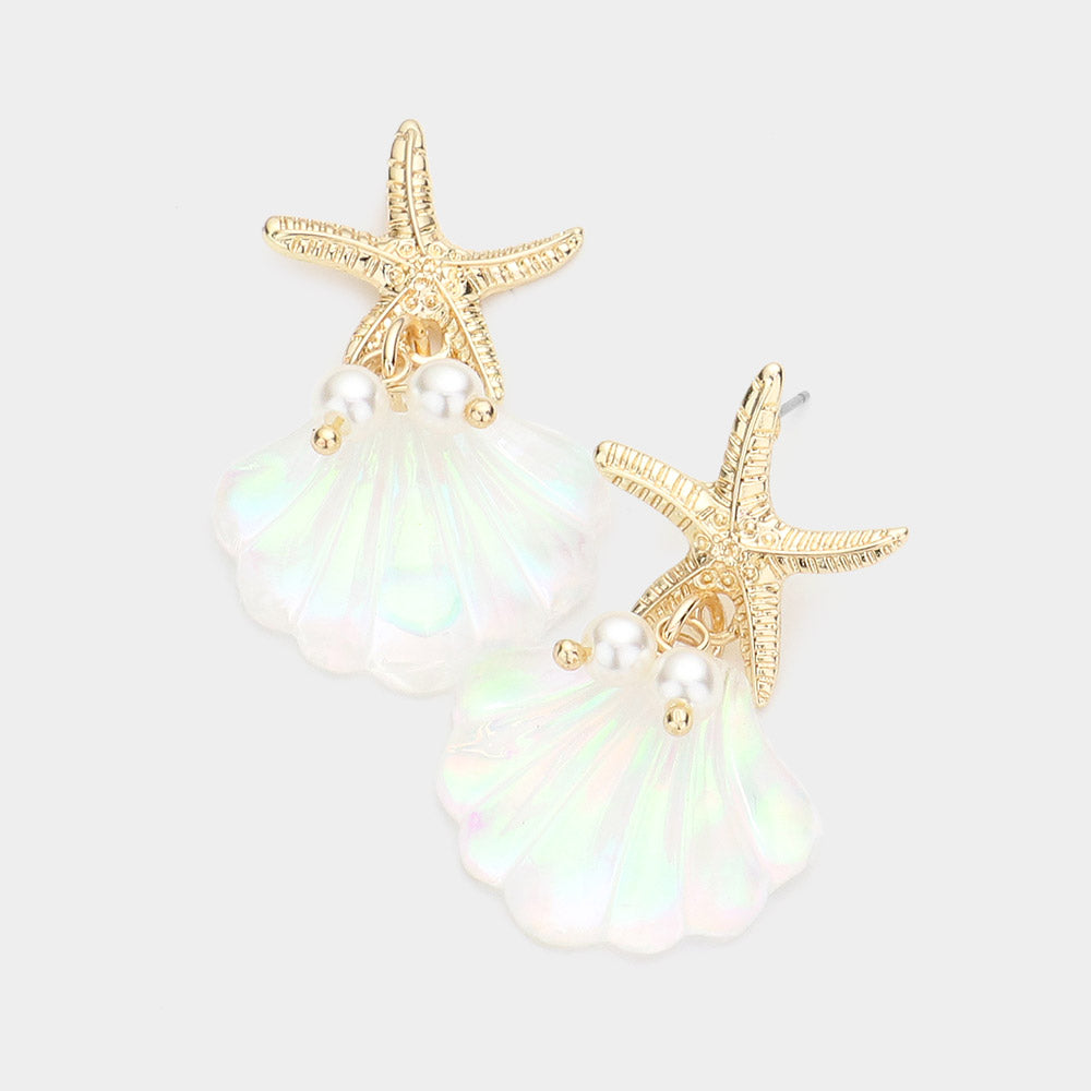 Coastal gold starfish pearl shell link drop earrings shown as beach inspired jewelry