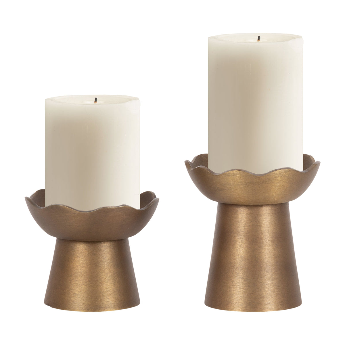 Gold sculptural candle holders featuring an elegant wavy silhouette.