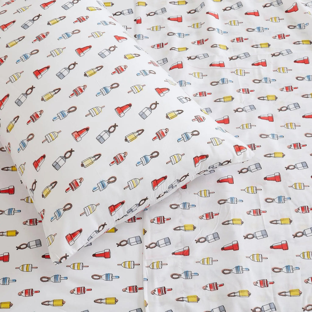Coastal Sheet Set - Nantucket Collection by Great Bay Home; white bed sheets with red, blue, and yellow buoy pattern.