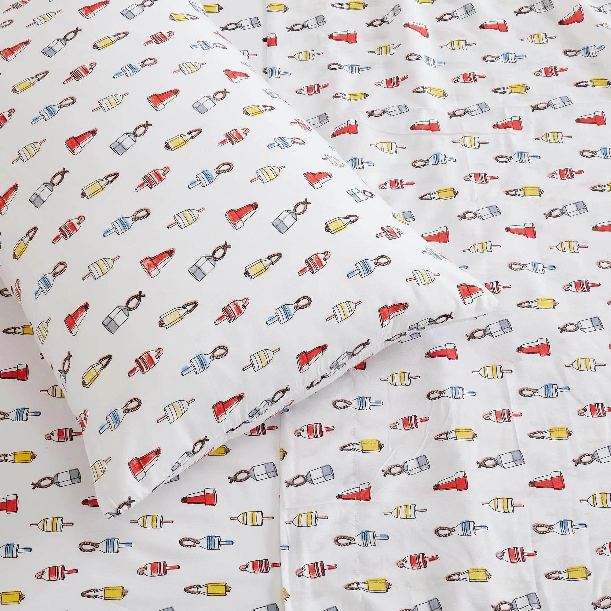 Coastal Sheet Set - Nantucket Collection by Great Bay Home; white bed sheets with red, blue, and yellow buoy pattern.