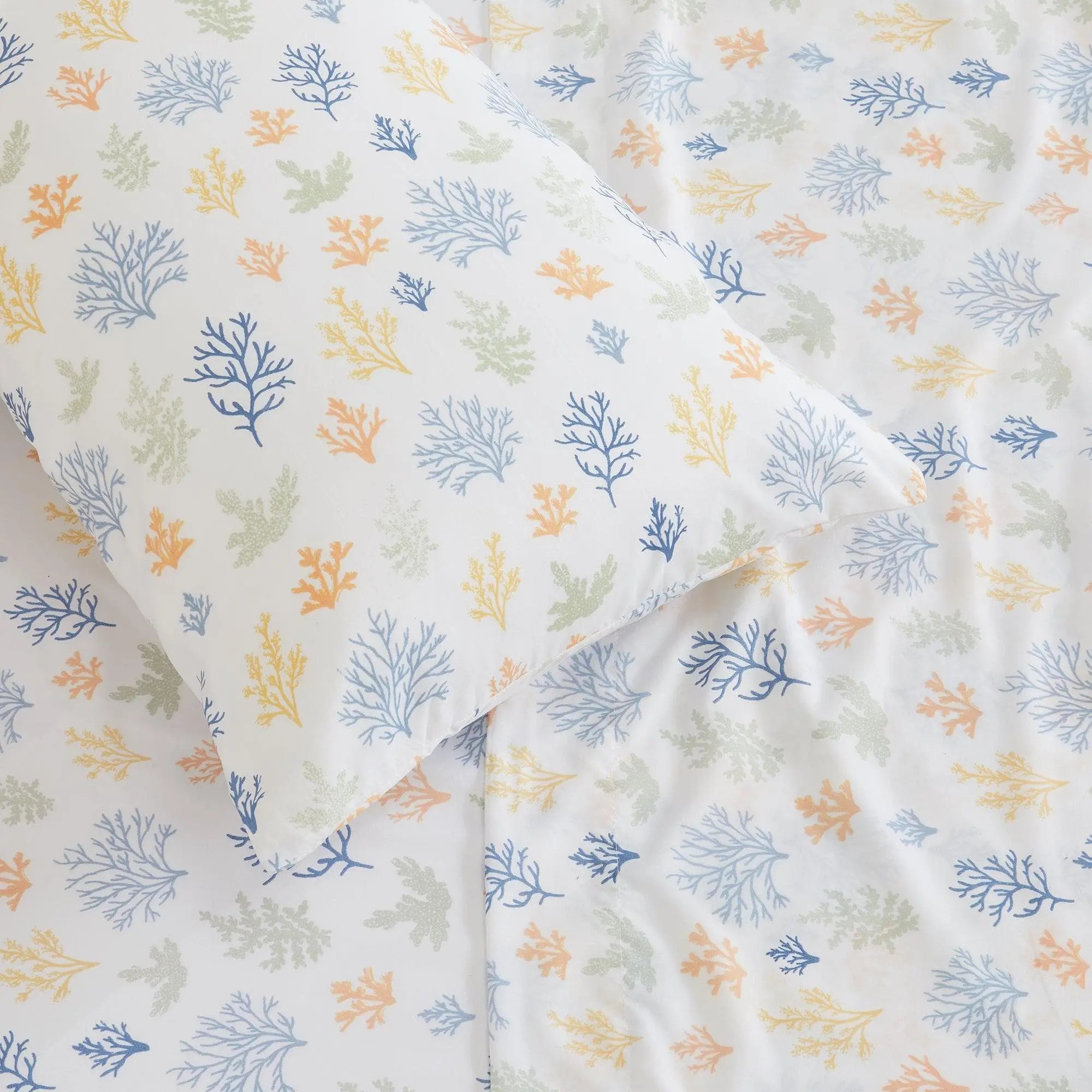 Coastal Sheet Set - Nantucket Collection; white sheets with blue, orange, yellow, and green coral prints.