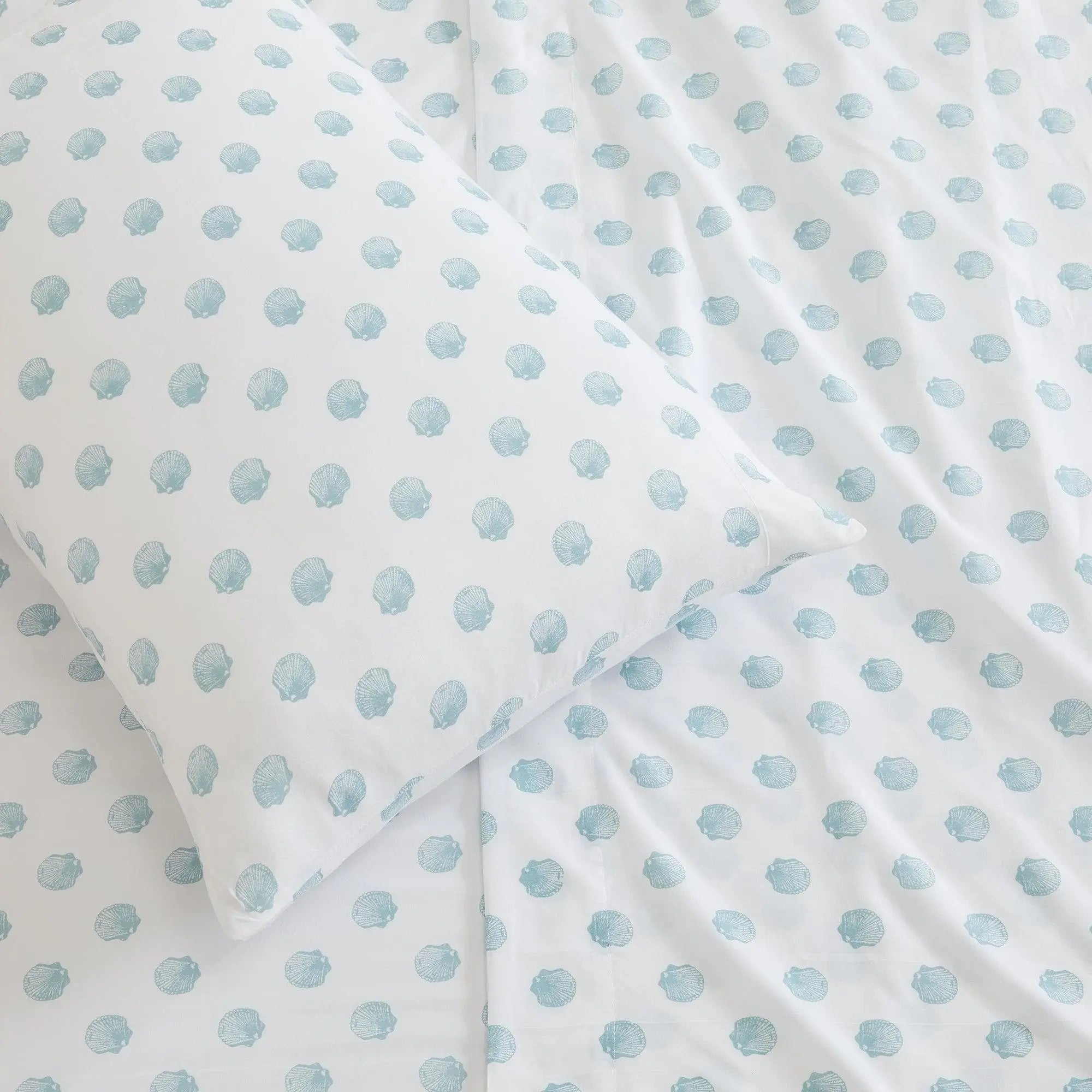 Coastal Sheet Set by Great Bay Home, Nantucket Collection; white sheets with light blue seashell print.
