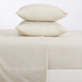 Stripe Sheet Set, Adeline Collection by Great Bay Home; beige with white vertical stripes on bed with 2 matching pillows