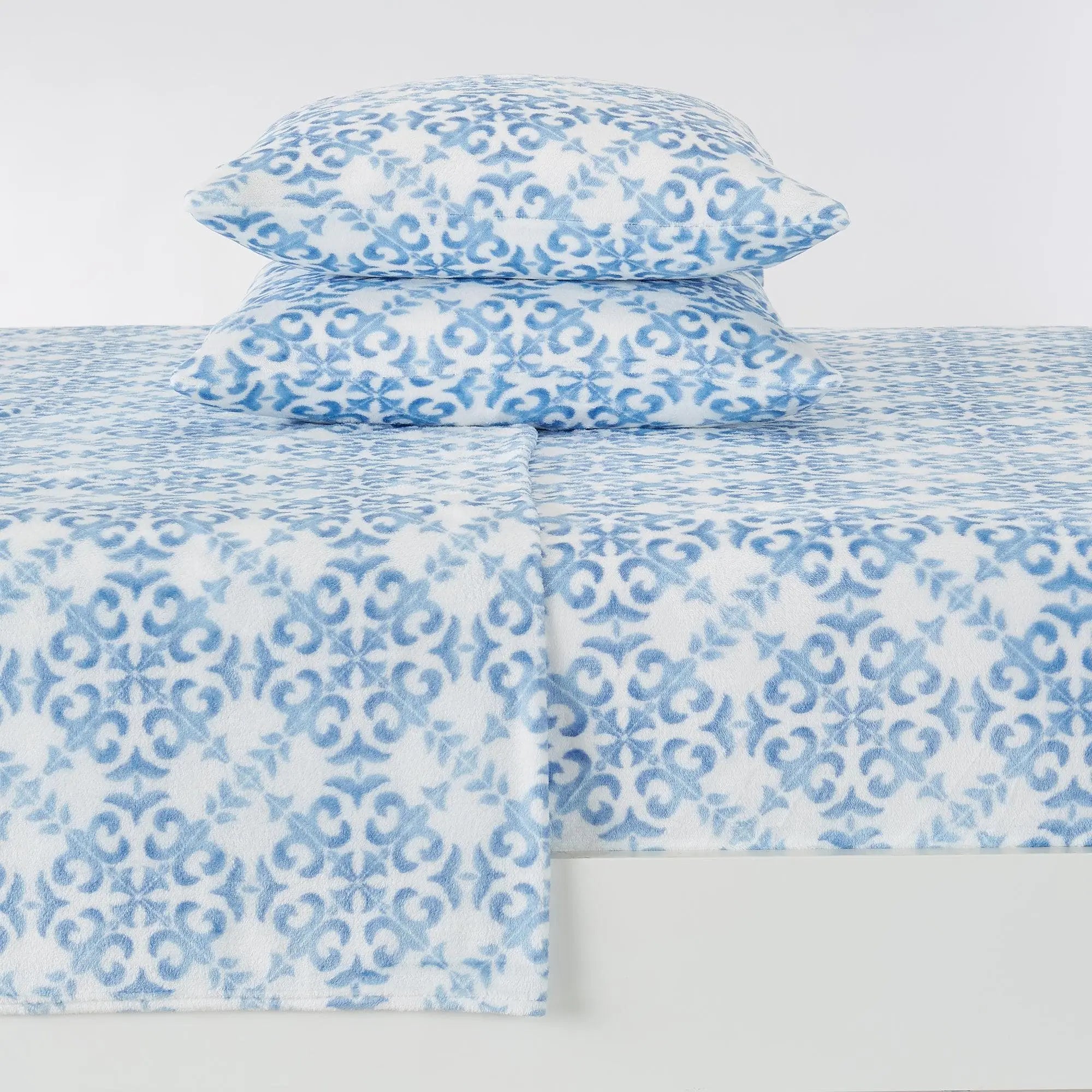 Velvet Luxe Bed Sheets - Lattice Collection by Great Bay Home; blue and white lattice bedding with two matching pillows.