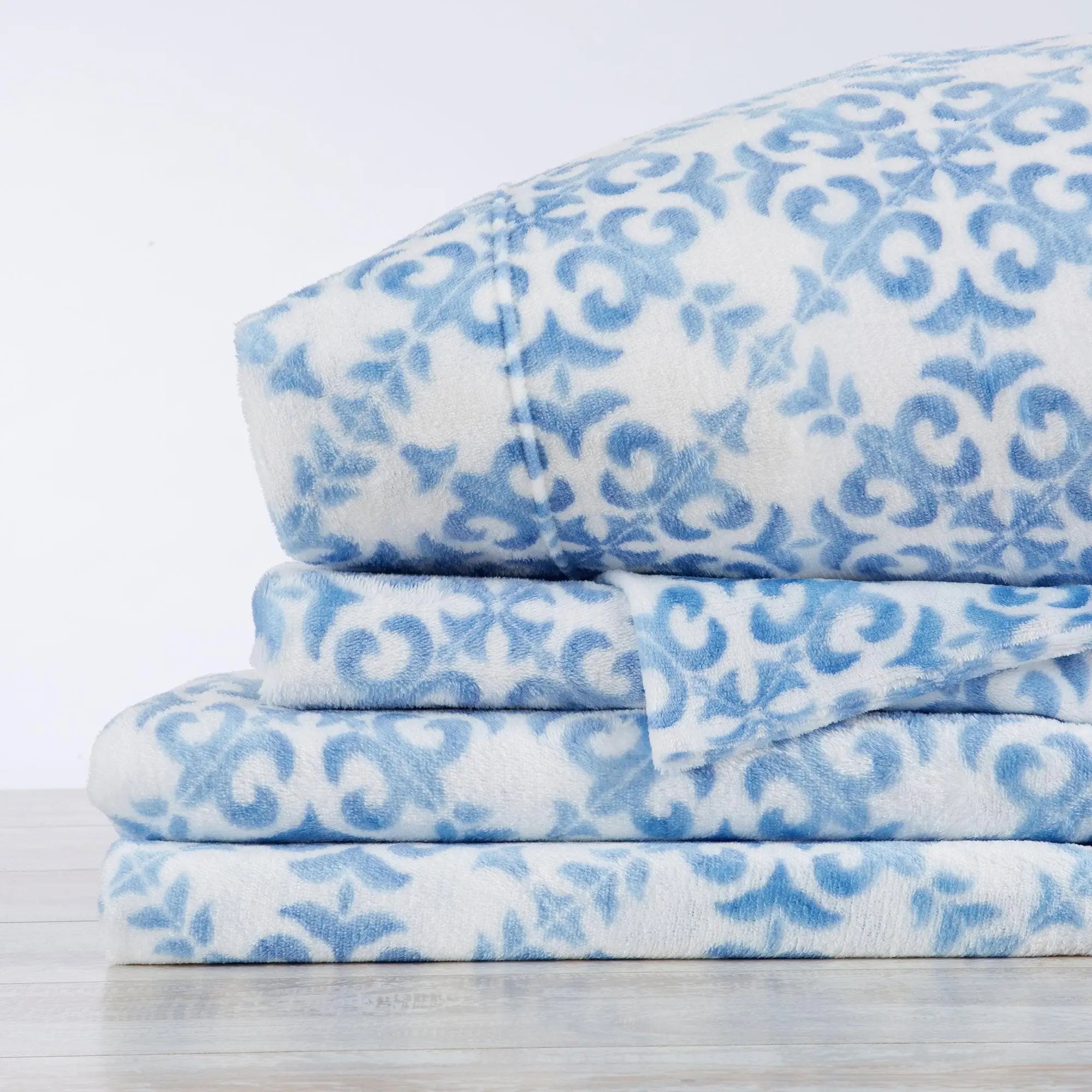 Velvet Luxe Bed Sheets, Lattice Collection by Great Bay Home in blue and white lattice pattern.