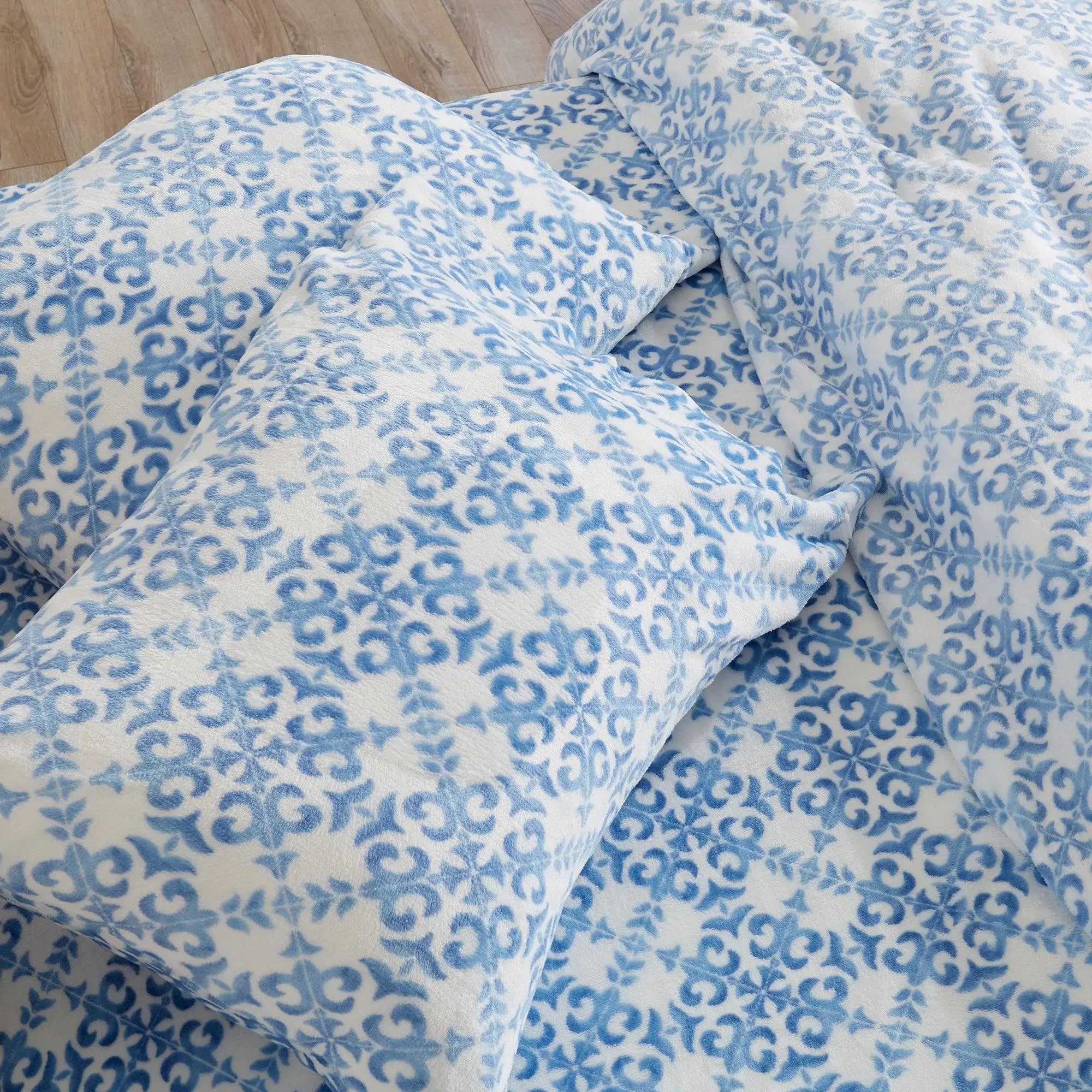 Velvet Luxe Bed Sheets by Great Bay Home, blue-and-white lattice pattern.
