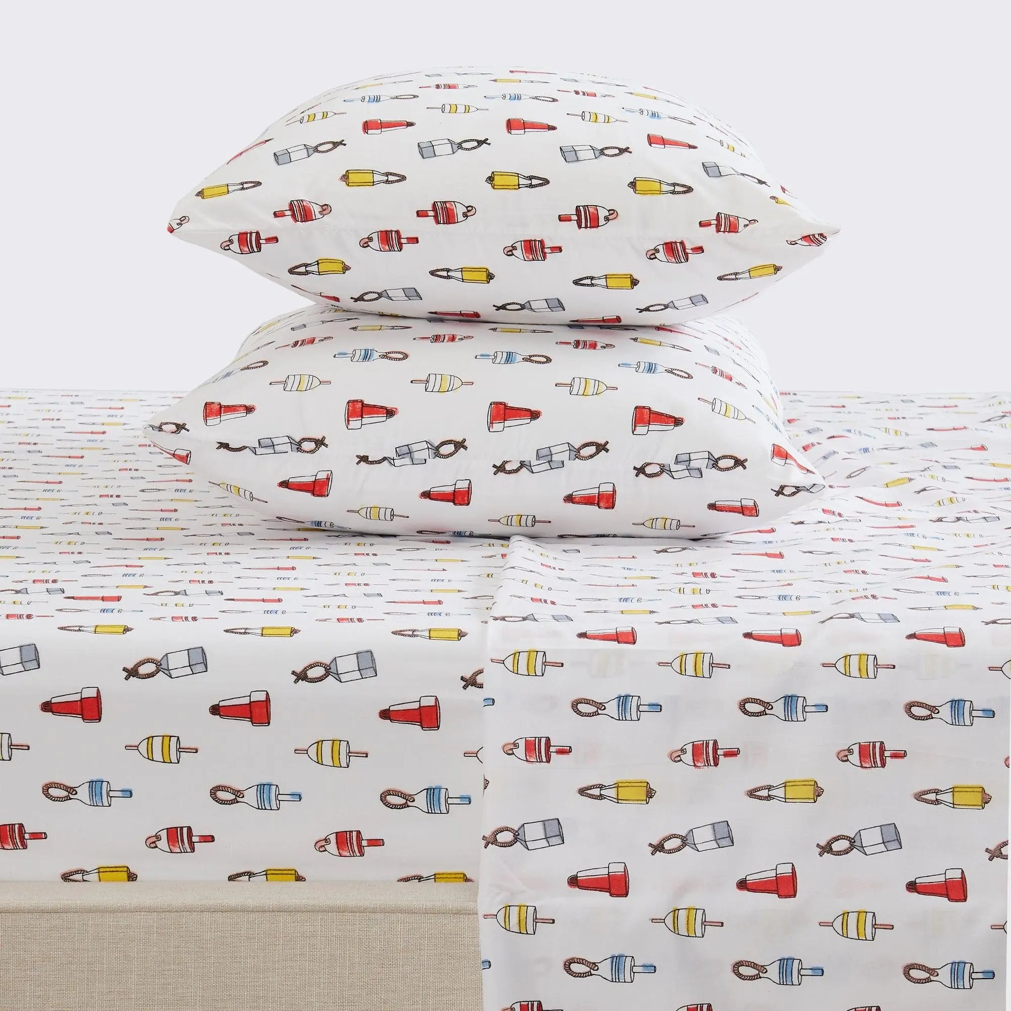 Coastal Sheet Set - Nantucket Collection by Great Bay Home; white sheets with red, blue, yellow buoy pattern