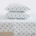 Coastal sheet set by Great Bay Home; Nantucket collection, white with light blue seashell pattern, two pillows shown.